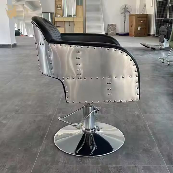 Industrial-Style Black Leather Barber Chair with Riveted Metal Sides and Hydraulic Base