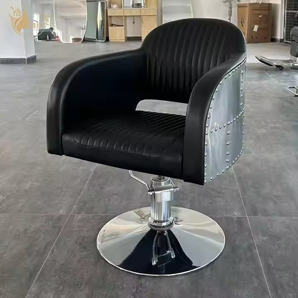 Industrial-Style Black Leather Barber Chair with Riveted Metal Sides and Hydraulic Base